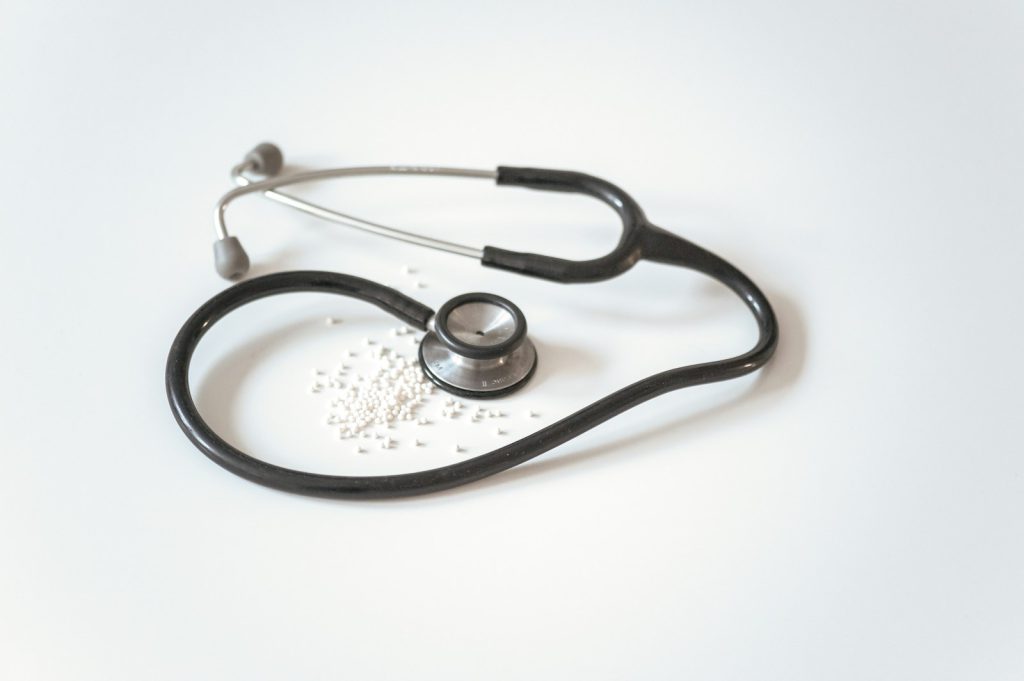 A stethoscope resting on a white surface