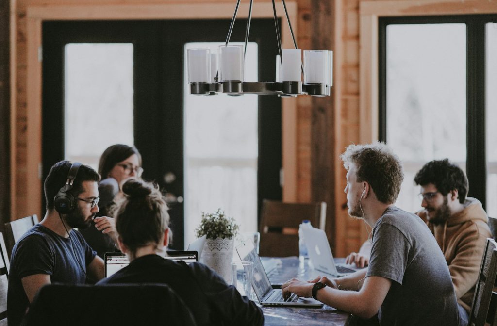 Professionals working together around a table