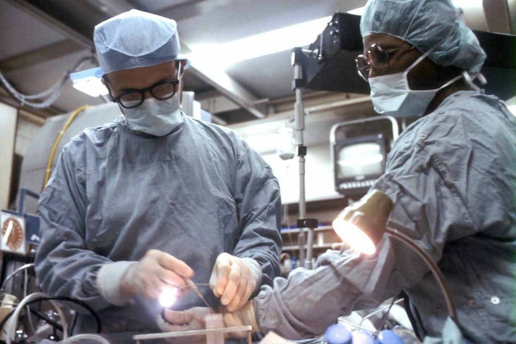 Surgeons at work in an operating theatre
